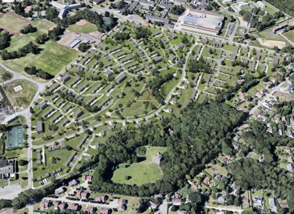 NATO Shape te Mons, constructie van 600 wooneenheden, word voorzien van 54 stuks rookafvoeren in de trappenhallen van de hand van D-Lux